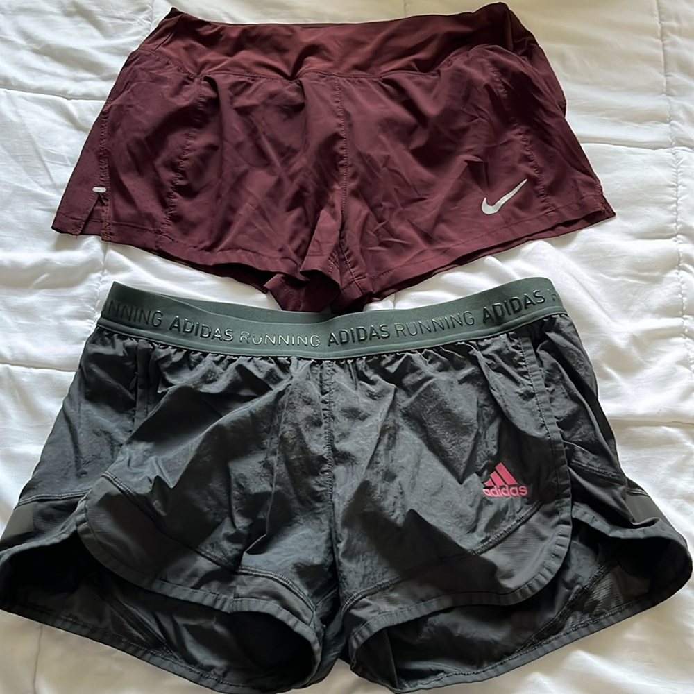 2 pairs of running shorts one Nike size medium one adidas also size medium
